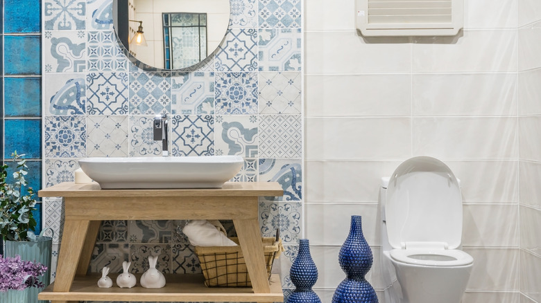 Bathroom with freestanding vanity