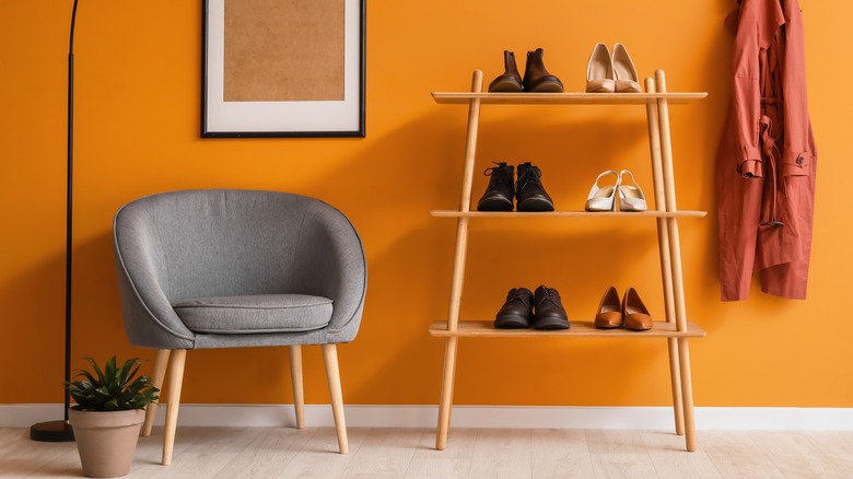 orange foyer with shoes
