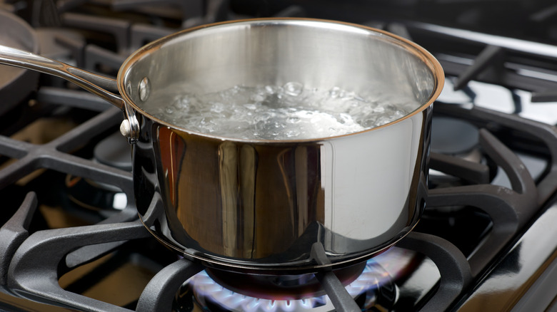 metal pot of boiling water
