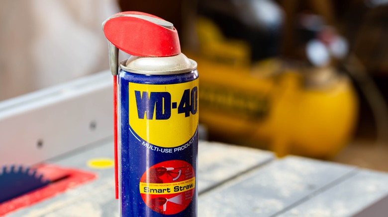 wd-40 can on wood tabletop