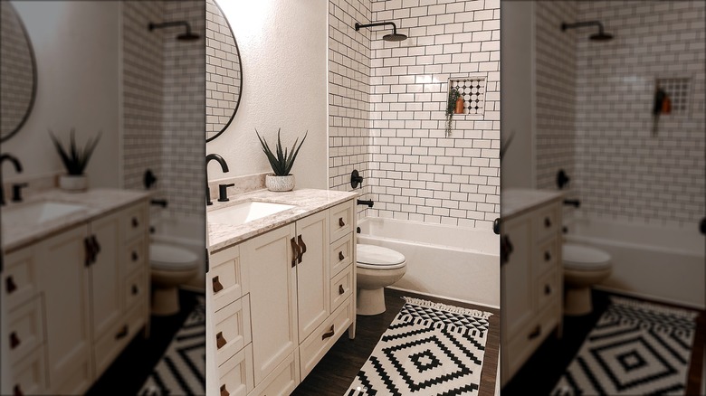 Small bathroom with white subway tiles in shower.