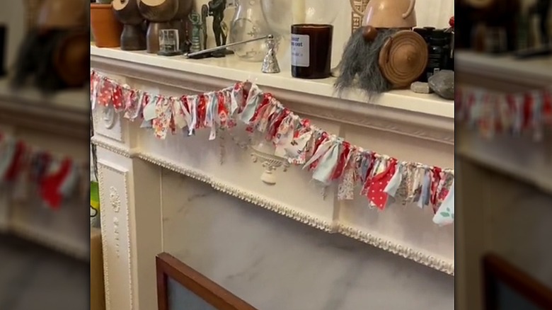 Scrap ribbon bunting hanging decoratively in a home