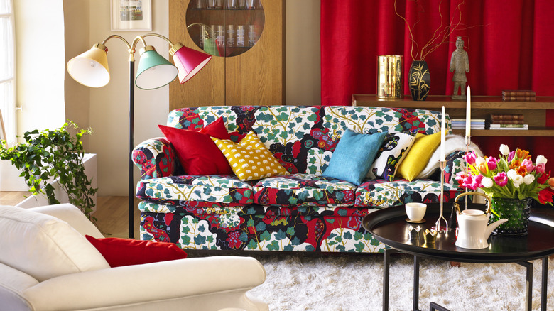 Bright living room with heavily patterned couch