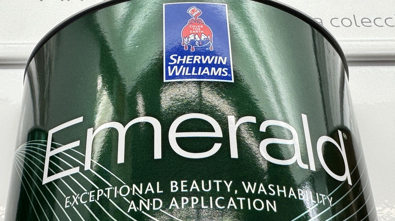 A close up of a can of a Sherwin Williams' Emerald can