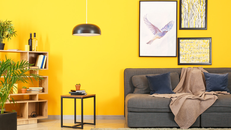 lemon yellow accent wall in living room