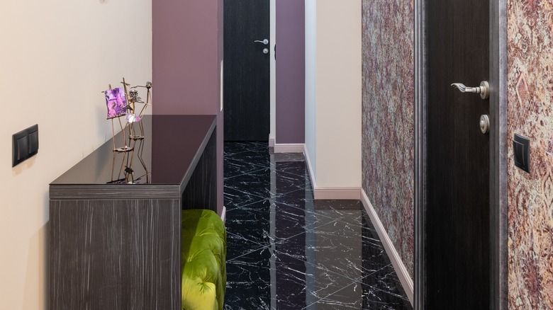 deep liliac color on hallway accent wall