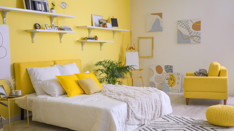 mellow yellow bedroom accent wall