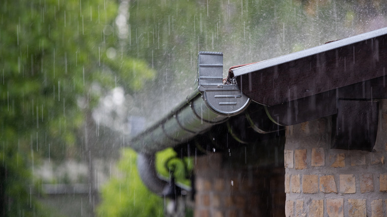 rain splashes on roof gutters