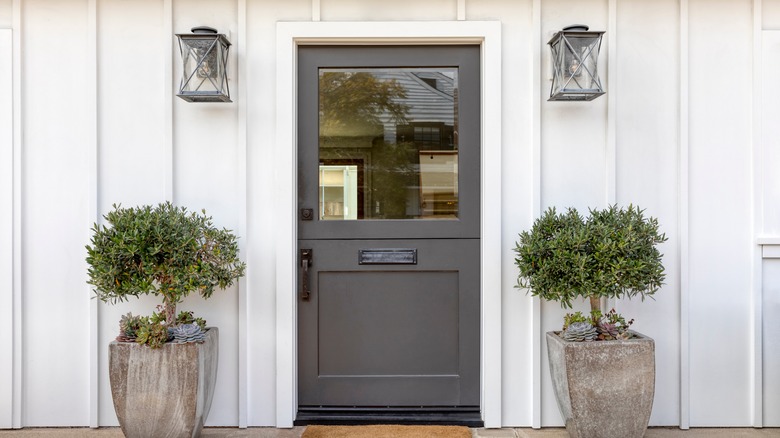 gray front door white house