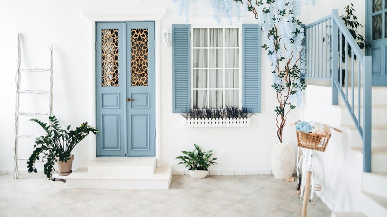 light blue door white house