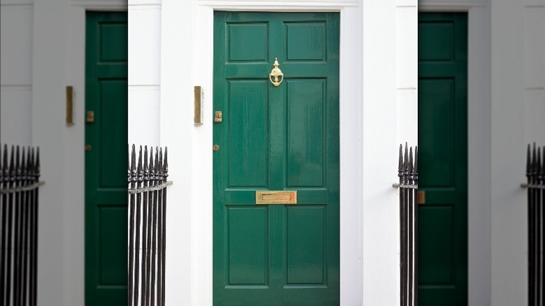 green front door white house