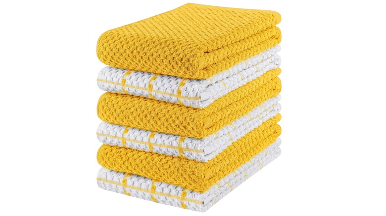 yellow and white kitchen towels