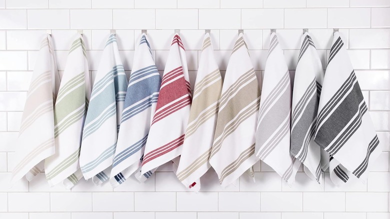 striped towels hanging on wall