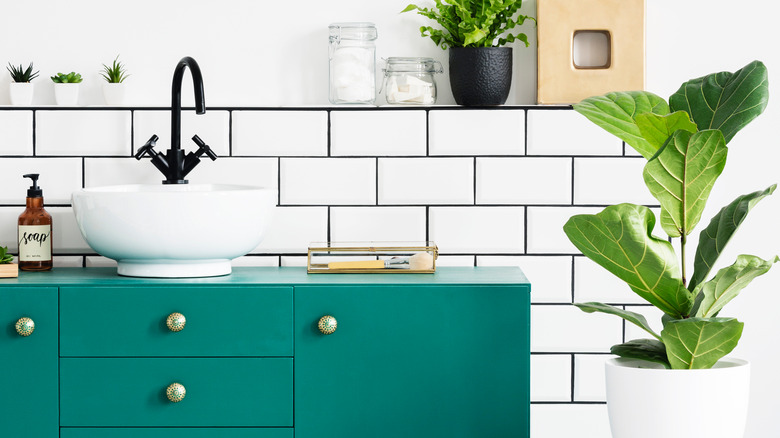 Teal blue bathroom cabinet