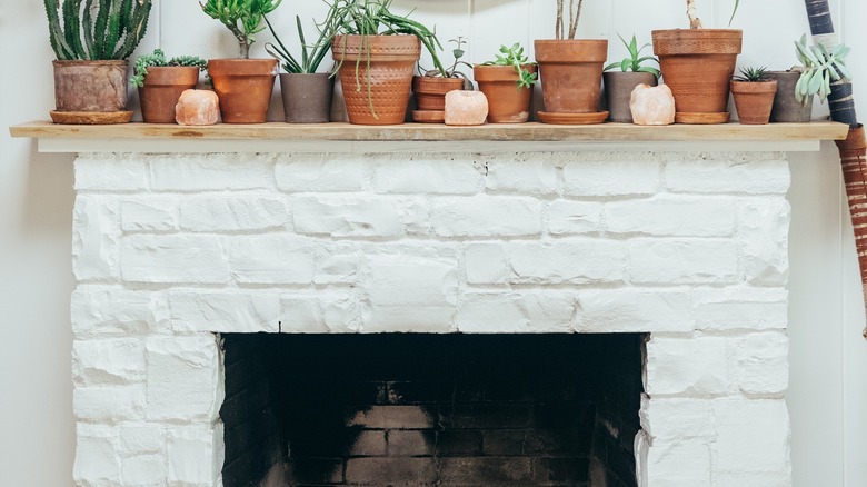 White painted brick mantel 