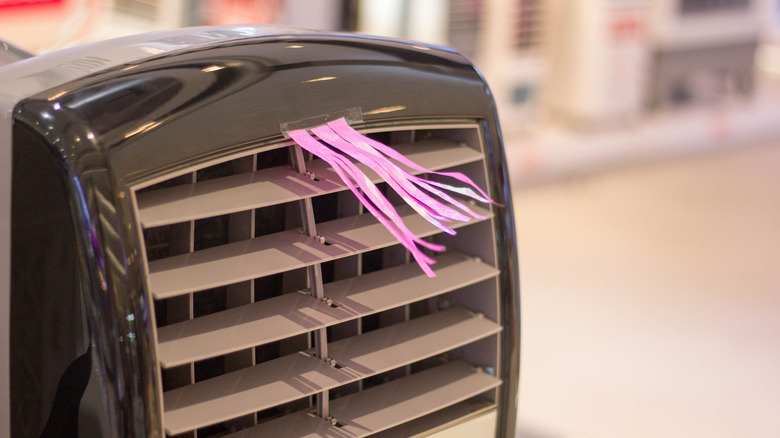 a tower fan blowing air