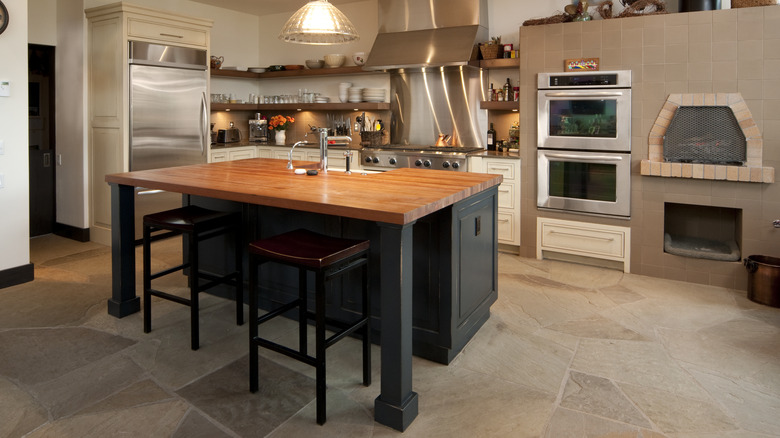 Kitchen with stone tile floor