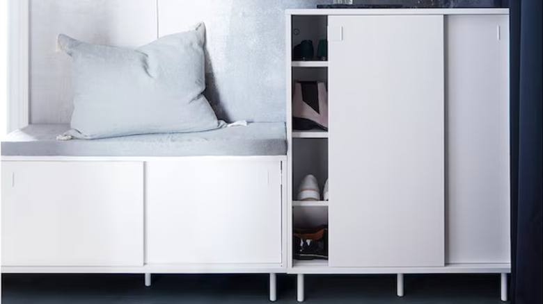 white shoe cabinet with sliding doors