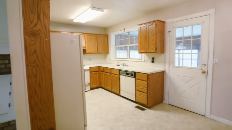 empty house with old kitchen