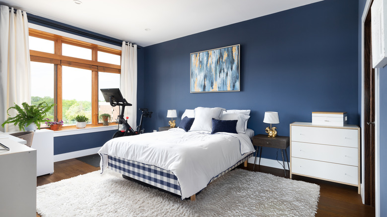 navy blue and white bedroom