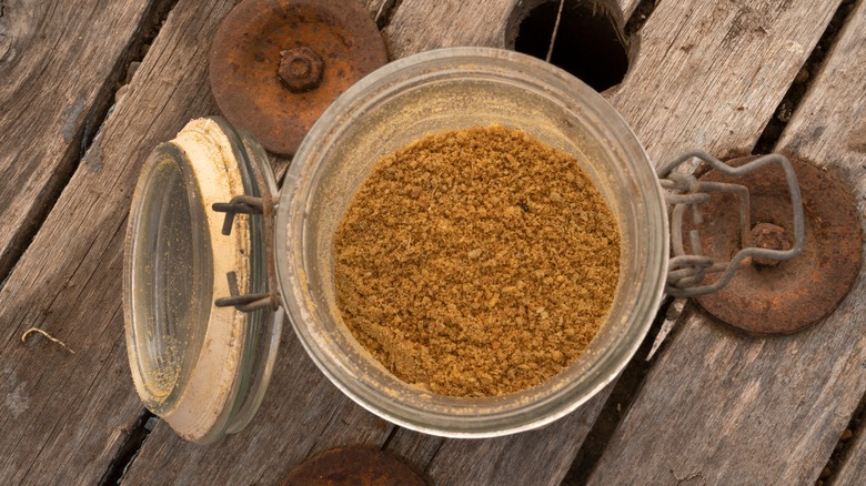 Overhead shot of a jar full of bone meal fertilizer