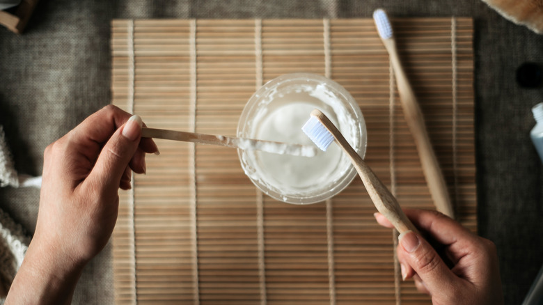 mixing toothpaste in bowl