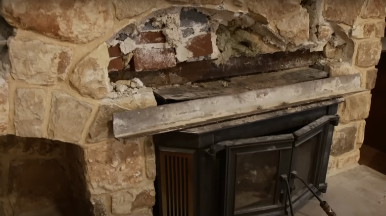 stone fireplace in demolition process