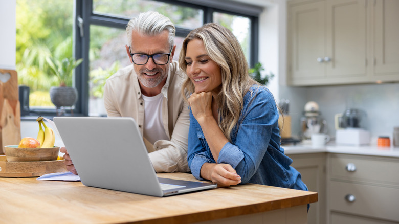 couple looking at laptop