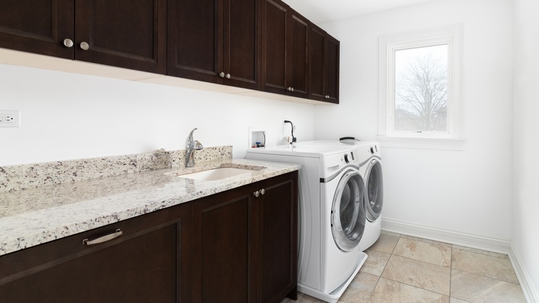 Laundry room with granite counter