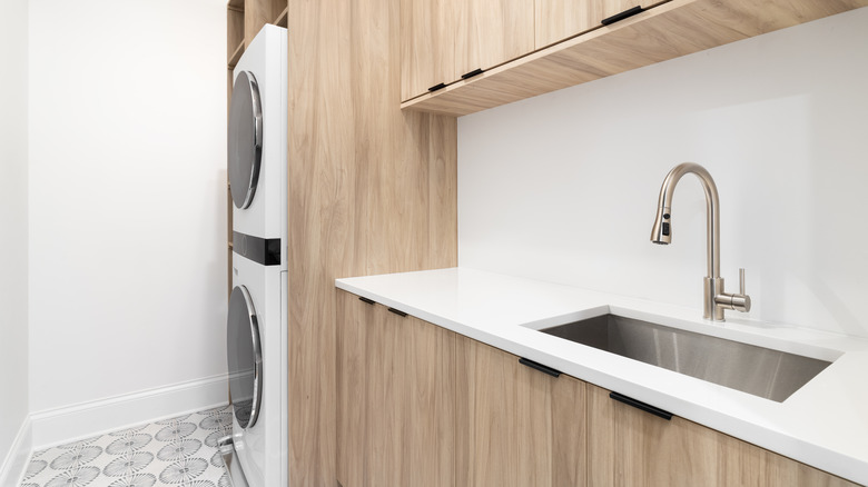 Laundry room with marble counter