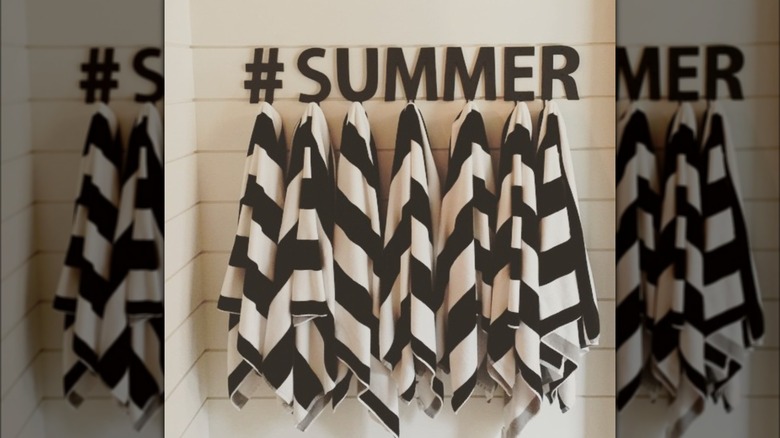 alphabet hooks holding towels