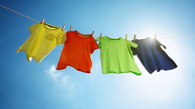 Clothes dry on line in the sun