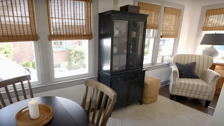 sunroom with painted black cabinet