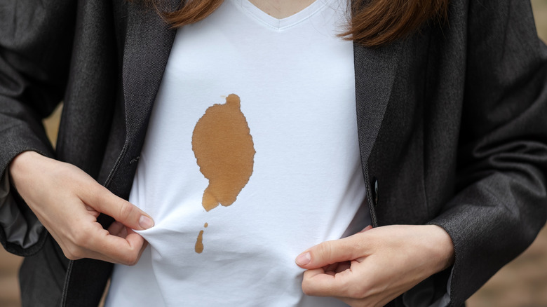 A coffee stain on a white shirt