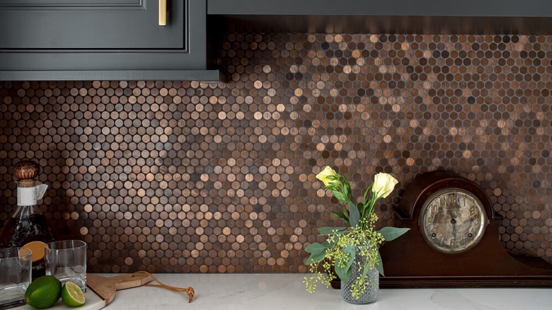 kitchen with copper tile backsplash