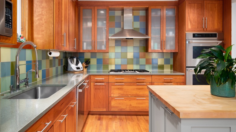 kitchen with colorful backsplash