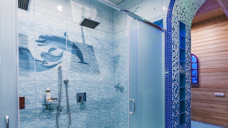 Shower with dolphin tiles