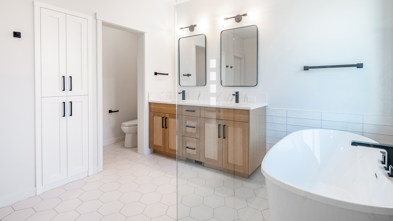 Modern white bathroom with black hardware