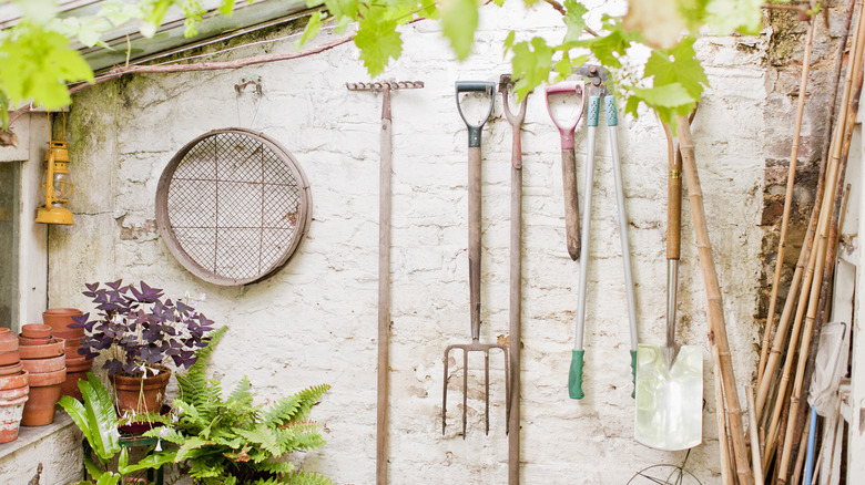 garden tools on wall