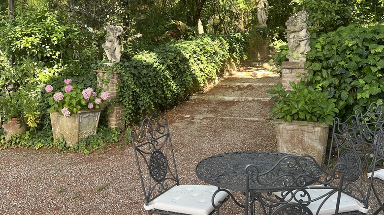 Tuscan-style walkway in garden