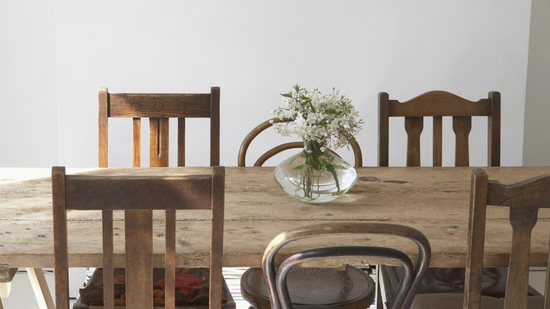 Kitchen with wood dining table and wood chairs