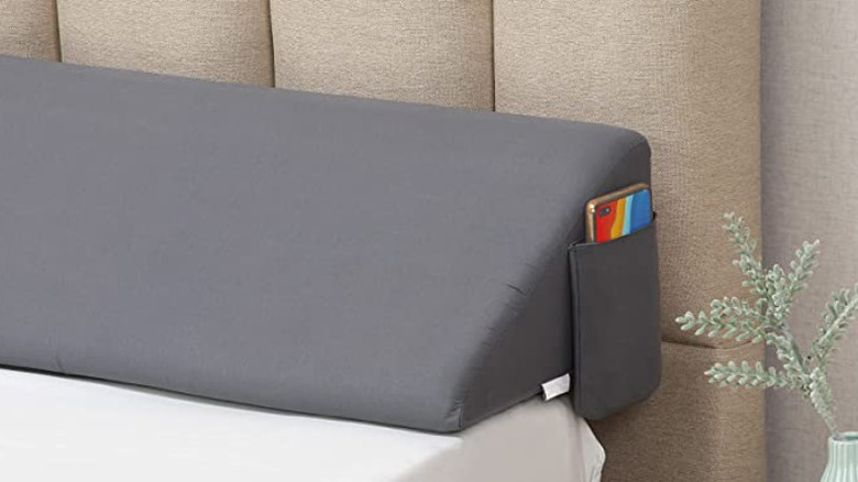 Gray wedge pillow with pocket