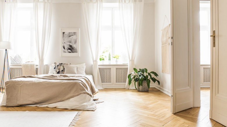 Bedroom with hardwood flooring