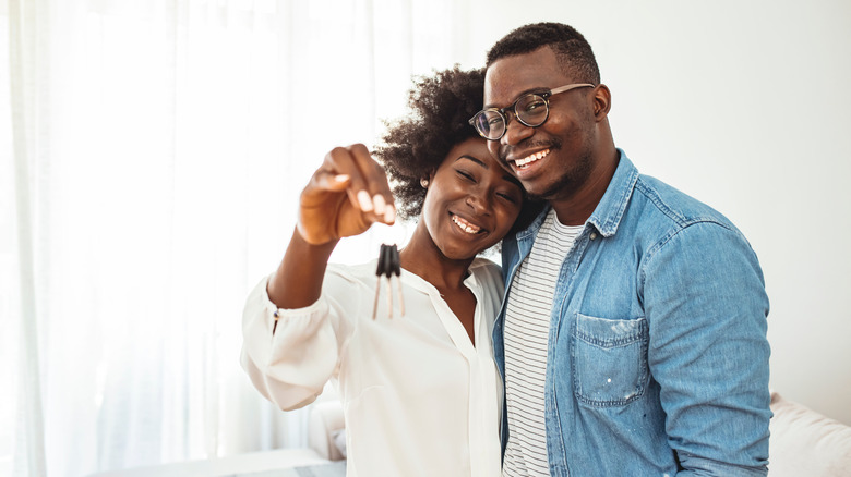 happy couple in new home