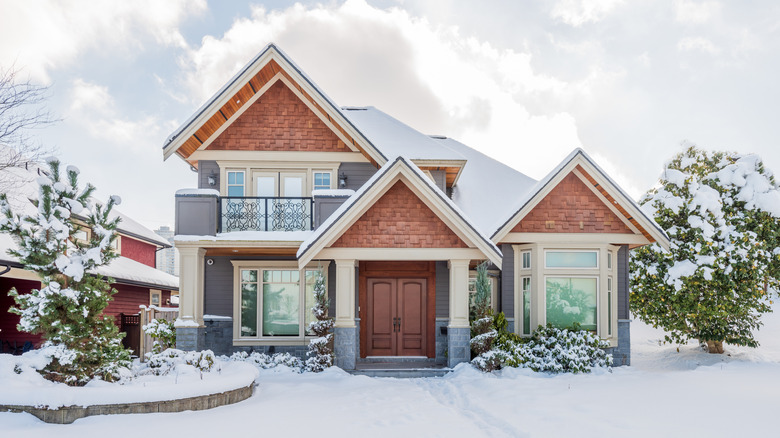 suburban house in the snow