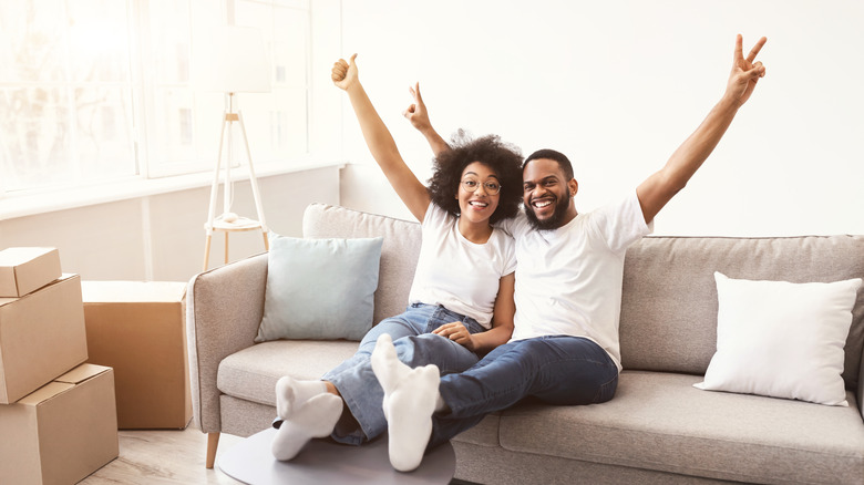 couple celebrating in house