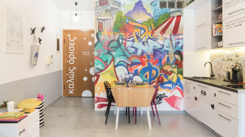 dining table against graffiti wall