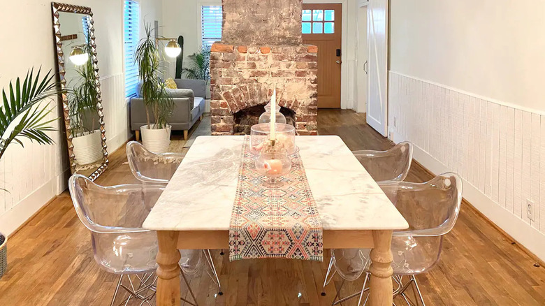 eclectic dining room with fireplace