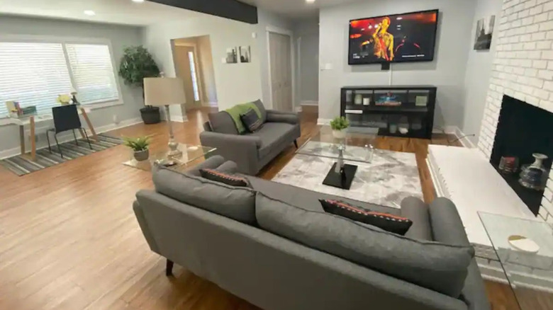 gray living room with fireplace