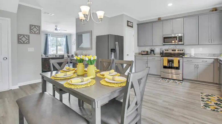 gray kitchen with yellow dinnerware